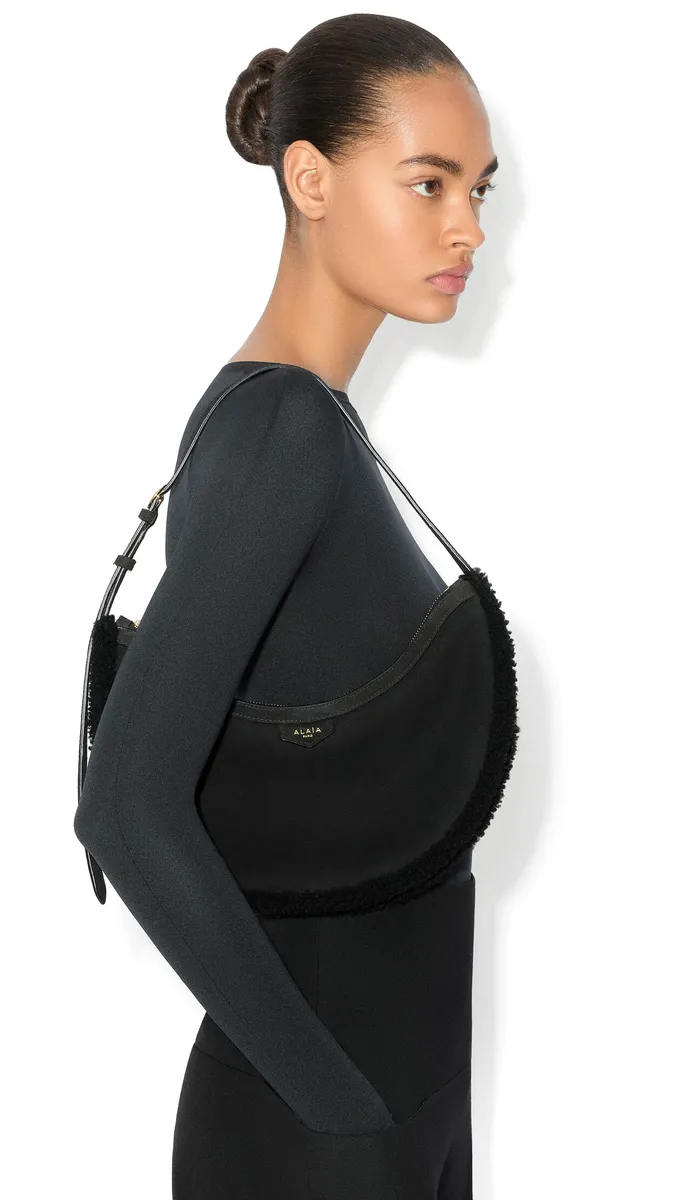 Alaïa One Piece Demi Lune Bag In Merino Shearling | Thumbnail 3 Alaïa One Piece Demi Lune Bag In Merino Shearling | Thumbnail 3