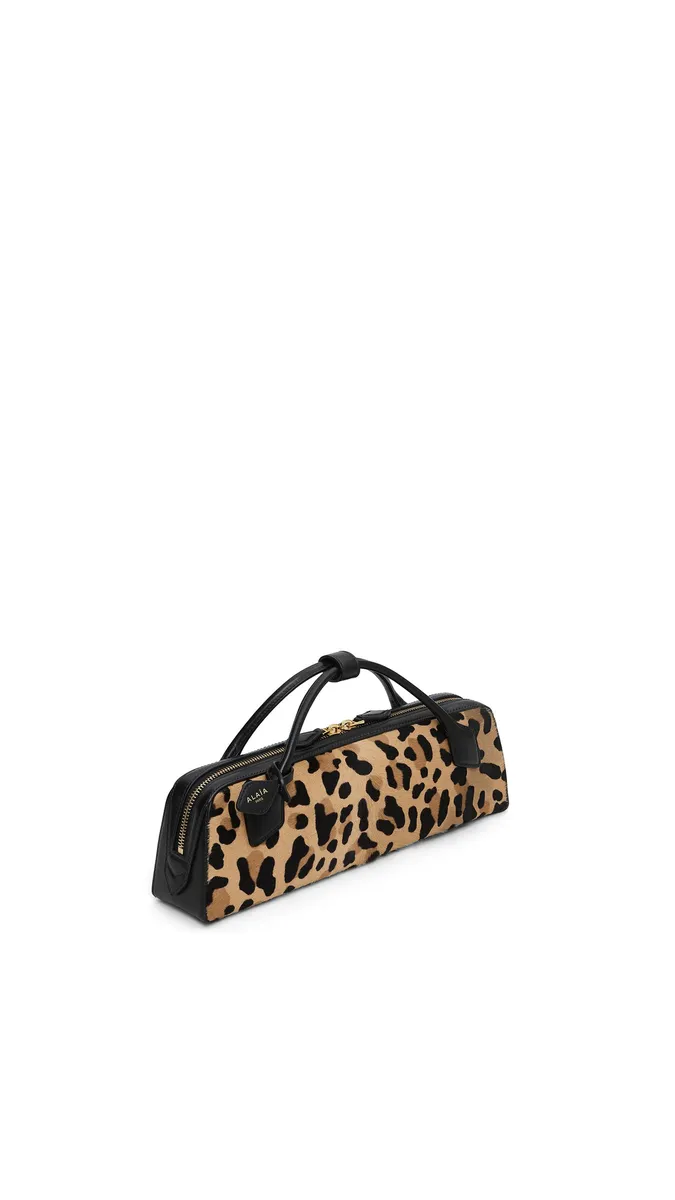 Alaïa Le Teckel Clutch In Leopard Haircalf | Thumbnail 2 Alaïa Le Teckel Clutch In Leopard Haircalf | Thumbnail 2