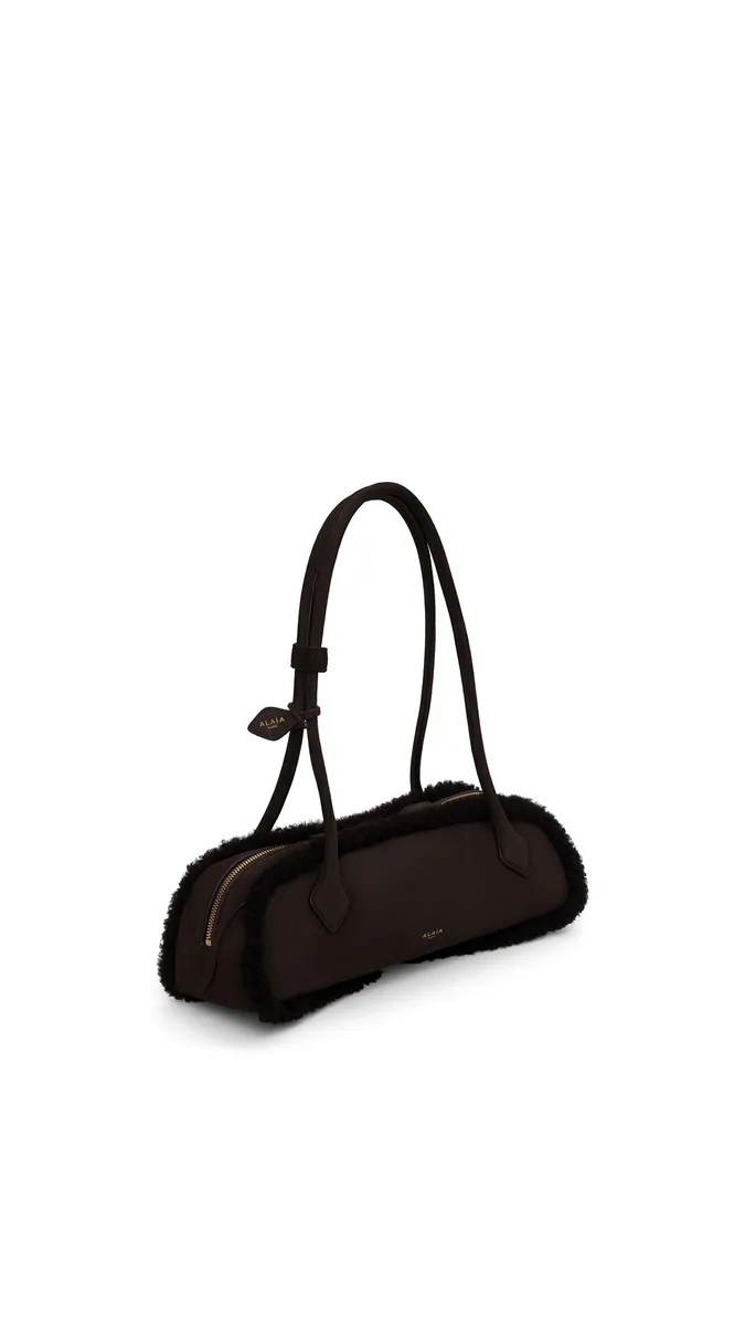 Alaïa Le Teckel Medium Bag In Merino Shearling | Thumbnail 2 Alaïa Le Teckel Medium Bag In Merino Shearling | Thumbnail 2