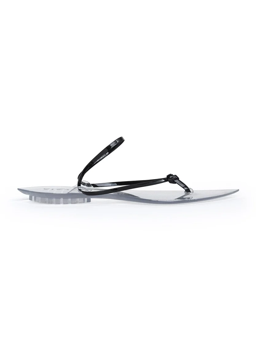 Alaïa Invisible Thong In Patent Leather