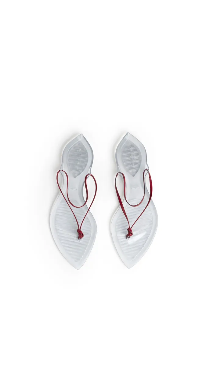 Alaïa Invisible Thong In Patent Leather | Thumbnail 4