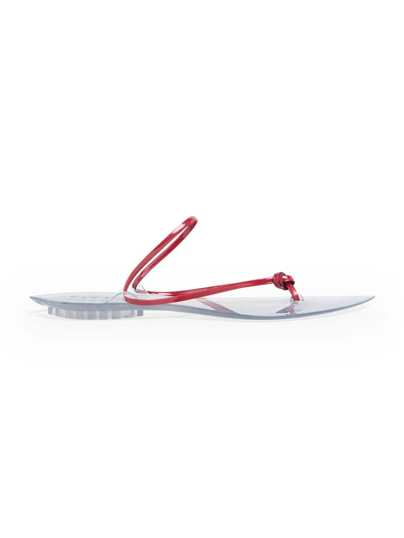 Alaïa Invisible Thong In Patent Leather