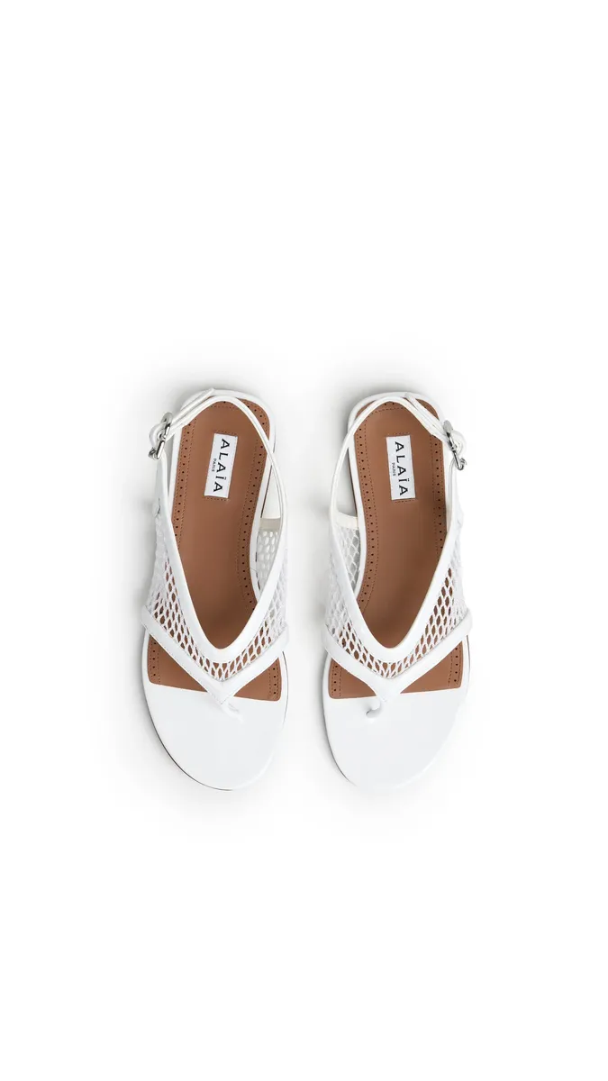 Alaïa Fishnet Thong Sandals In Patent Calfskin | Thumbnail 4 Alaïa Fishnet Thong Sandals In Patent Calfskin | Thumbnail 4