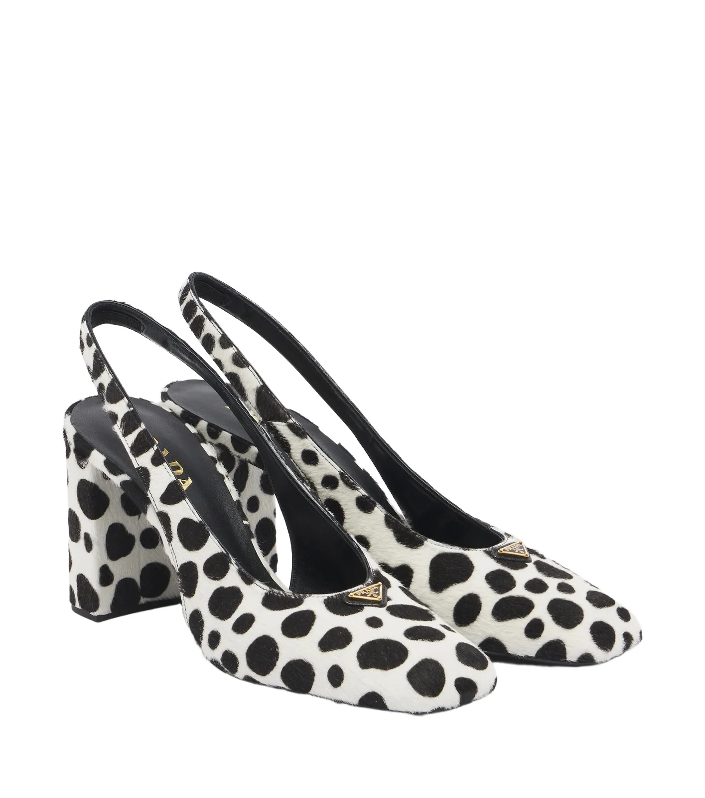 Cow-print calf hair slingback pumps