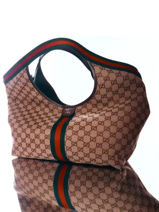 The Best Designer Handbags to Shop Now — featuring Gucci Giglio Large Leather-trimmed Canvas-jacquard Tote, Gucci Jackie Giorno Leather-trimmed Suede Tote Bag, Chloé Paddington Embellished Leather Tote and more The Best Designer Handbags to Shop Now — featuring Gucci Giglio Large Leather-trimmed Canvas-jacquard Tote, Gucci Jackie Giorno Leather-trimmed Suede Tote Bag, Chloé Paddington Embellished Leather Tote and more