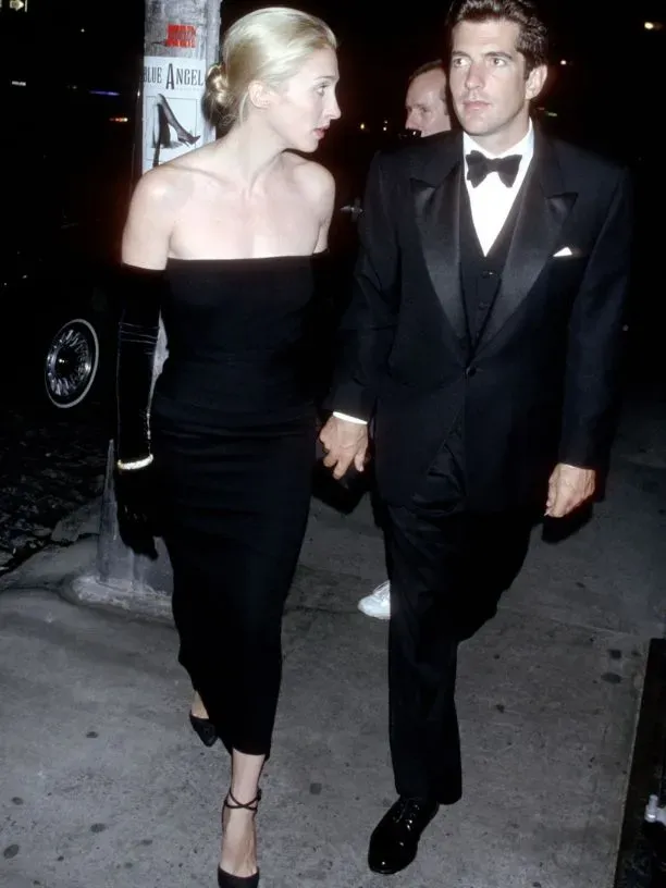 Carolyn Bessette Kennedy's Style — featuring TOTEME Strapless Pocket Maxi Dress, Valentino Garavani Vlogo Ruffled Velvet Gloves, Stella McCartney Off-the-shoulder Knitted Midi Dress and more Carolyn Bessette Kennedy's Style — featuring TOTEME Strapless Pocket Maxi Dress, Valentino Garavani Vlogo Ruffled Velvet Gloves, Stella McCartney Off-the-shoulder Knitted Midi Dress and more